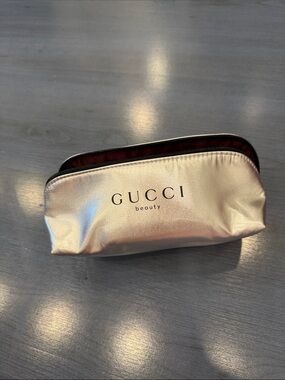 Gucci metallic silver beauty pouch